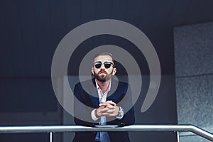 Portrait of stylish young man in sunglasses