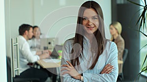 Portrait of successful beautiful executive businesswoman smart casual wear looking at camera and smile, arms crossed in