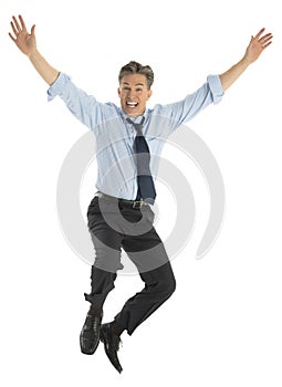 Portrait Of Successful Businessman Jumping In Joy