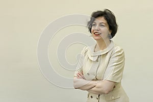 Portrait of successful confidence smiling business woman with crossed arms with copy space.
