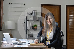 Portrait of successful confident pretty, Young asian business woman or freelancer wearing formal stylish clothes, arms