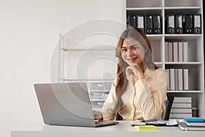 Portrait of successful confident pretty, Young asian business woman or freelancer wearing formal stylish clothes, arms