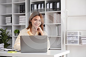 Portrait of successful confident pretty, Young asian business woman or freelancer wearing formal stylish clothes, arms