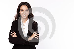 Portrait successful mature businesswoman, arms crossed. Confident business professional female smiling in smart suit. Business photo