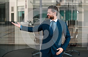 Portrait of successful office worker wearing classic outfit suit. Happy and excited winner gesture with raised arms