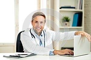 Portrait of successful specialist doctor working in hospital office looking happy and confident