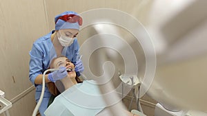 Portrait of a successful woman doctor dentist while working in a dental clinic.