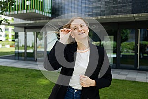 Portrait of successful woman in urban background. Business people concept