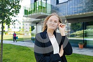 Portrait of successful woman in urban background. Business people concept