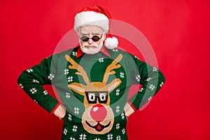 Portrait sullen frown grumpy grey hair old man in black spectacles santa claus headwear scold naughty kids on x-mas