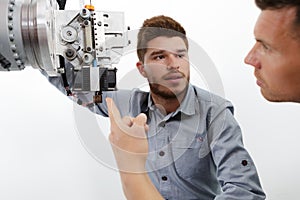 portrait supervisor instructing apprentices