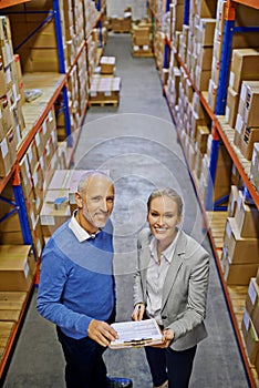 Portrait, supply chain and man with woman, inventory and warehouse with shipping paperwork and cargo. Clipboard