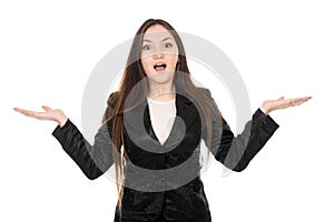 Portrait of a surprised Asian woman with hands to the sides in isolation over white background