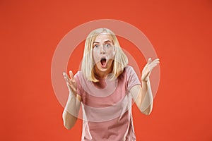 A portrait of surprised screaming woman