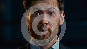 Portrait surprised shocked Caucasian adult bearded businessman middle-aged 35s man happy employee manager worker stand photo