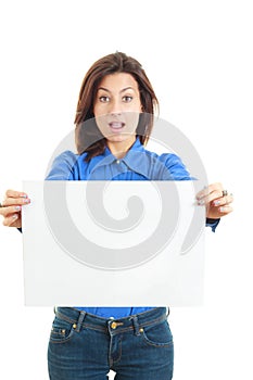 Portrait of surprised woman with advert looking at camera