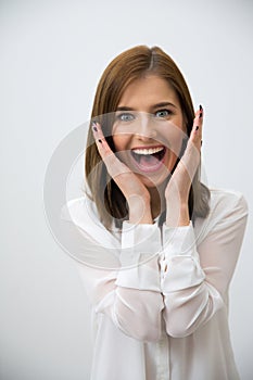 Portrait of a surprised young business woman