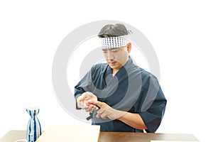 Portrait of a sushi chef