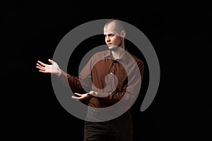 Portrait of a sympathetic emotional guy. Studio portrait of young handsome sympathetic man