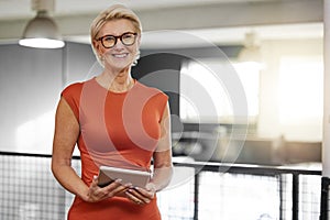 Portrait, tablet and smile of business woman in office with pride for career and job. Ceo, boss and happy face of