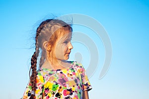 portrait of tanned five girls Portrait Portrait of a tanned little girl in a sundress by the sea