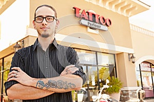 Portrait Of Tattoo Artist Standing Outside Parlor