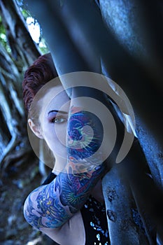 Portrait of tattooed woman.