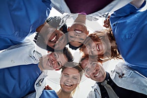 Portrait, teamwork or doctors in huddle with mission in collaboration for healthcare support. Hospital, happy people and