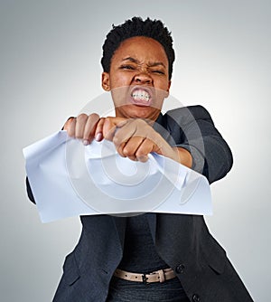 Portrait, tear and business black woman with paper in studio on gray background for frustration. Anger, documents and