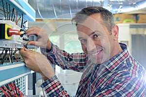 portrait technician using digital cable analyzer