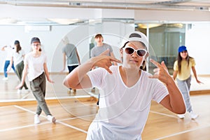 Teenage girl hip hop dancer during class