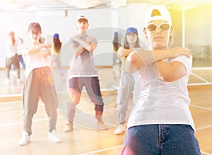 Teenage girl hip hop dancer during class