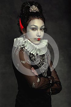 Portrait of a teen girl with dark curly hair, wearing a ruffled collar in vintage style