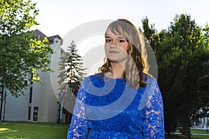 Portrait of teen girl with makeup posing in the nature