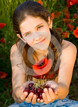 Portrait teen girl with poppy