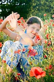 Portrait teen girl with poppy