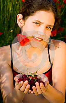 Portrait teen girl with poppy