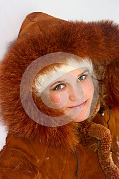 Portrait of teen girl in sheepskin coat