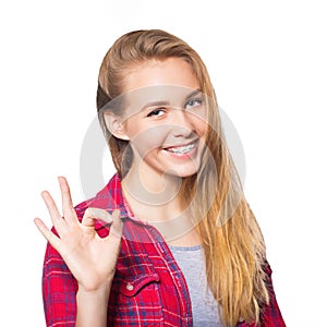 Portrait of teen girl showing dental braces.