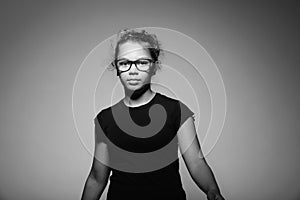 Portrait of teen with glasses in the studio