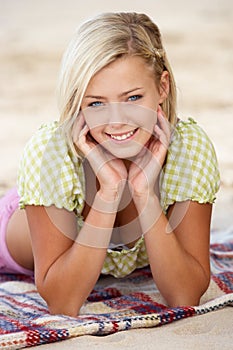 Portrait teenage girl on beach