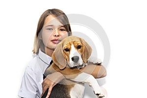 Portrait of a teenage girl with a dog breed Beagle