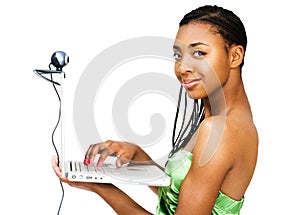 Portrait of teenage girl using a laptop