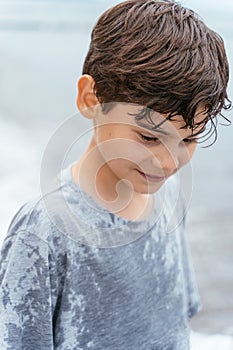 Portrait of teenager on the beach. Family vacation by the sea. Active lifestyle