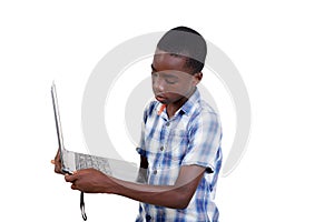 portrait of a teenager connecting a key to the laptop
