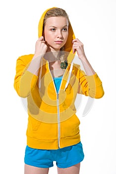 Portrait of teenager girl adjusting draped hood