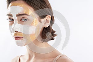 Portrait of tender pretty woman with face mask