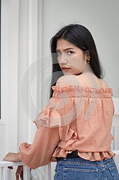 Portrait of thai woman dressed in pink