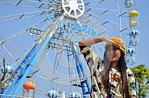 Portrait thai women with Ferris wheel