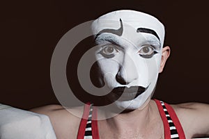 Portrait of a theatrical actor with mime makeup